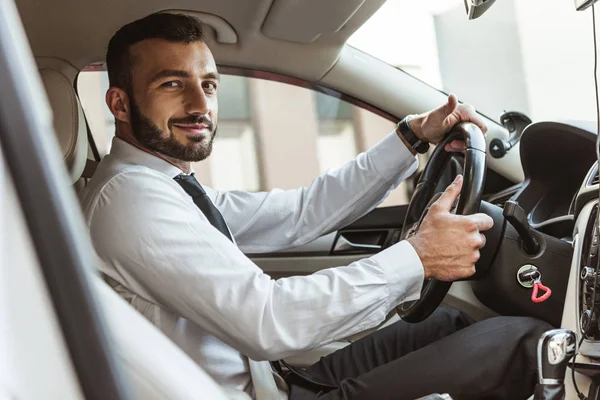 Smiling Handsome Driver Holding Steering Wheel Looking Camera Car — стоковое фото