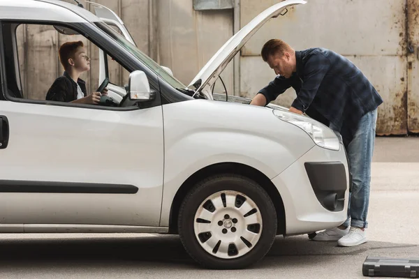 Side View Father Son Repairing Car Open Hood — стоковое фото